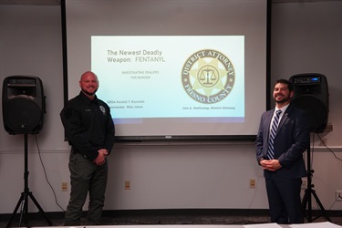 DA Investigations Commander Michael Johns (left) and Sr Deputy District Attorney Kendall Reynolds (right) presenting to fellow law enforcement about Fentanyl murder investigations/prosecutions.